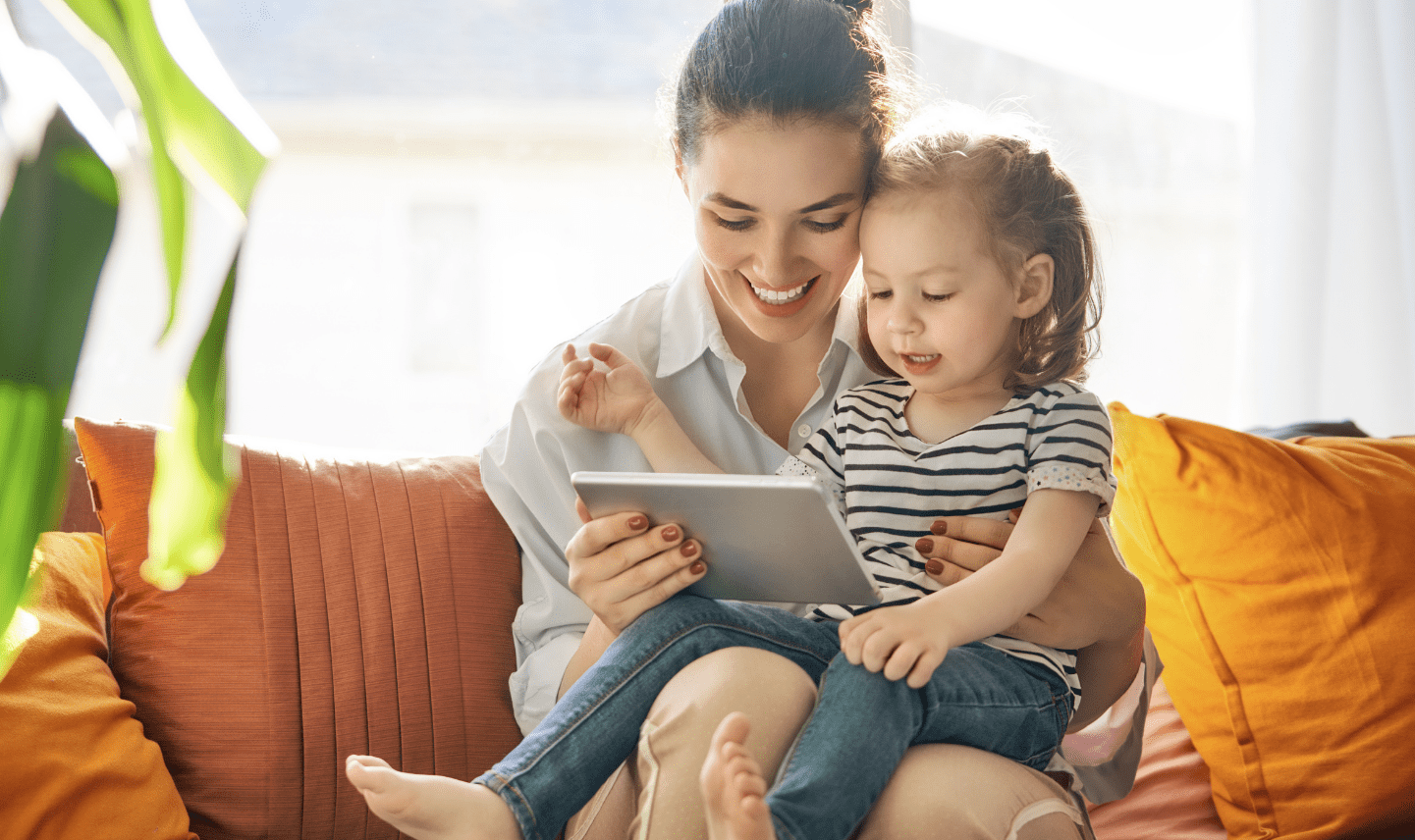 Mom and child looking at tablet